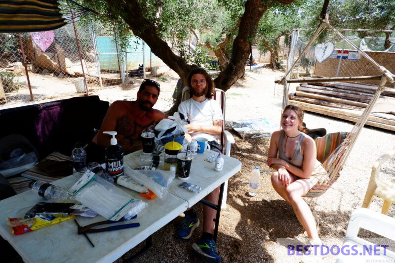 Nikos with two of his volunteers